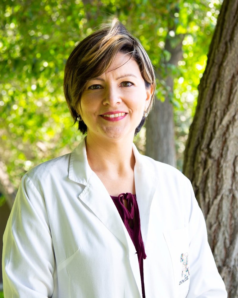 Registered Dietitian in white clinical coat, founder of Capital Nutrition Group Ottawa