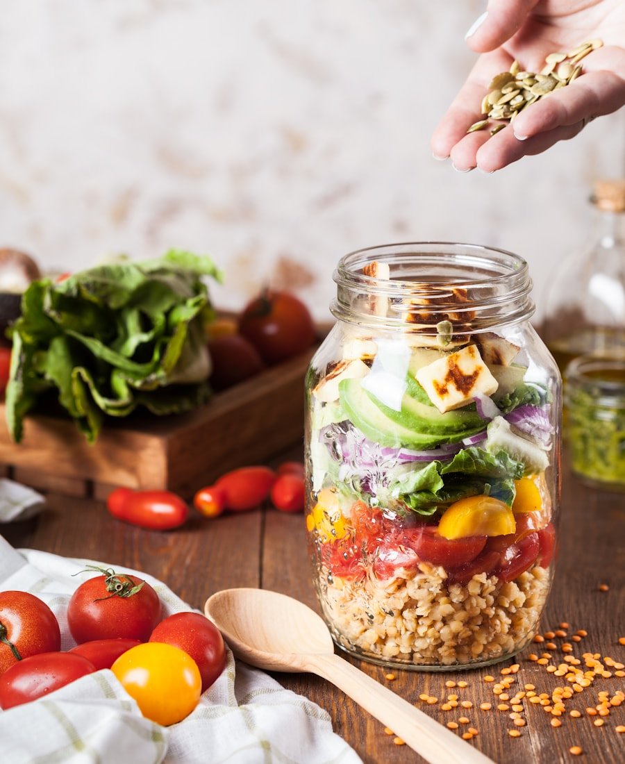 Layered glass jar of fresh greens, tomatoes, avocado, lentils, and seeds — evidence-based nutrition counselling at Capital Nutrition Group, Ottawa