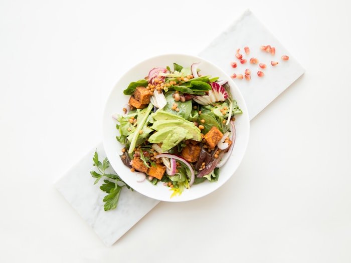Simple grain and lentil bowl with pomegranate — senior and older-adult nutrition