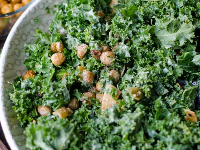 Bowl of fresh kale and roasted chickpeas — plant-based, vegetarian, and vegan nutrition